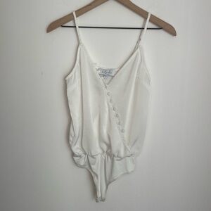 Revolve L’academie White V-neckline Bodysuit Top size XXS